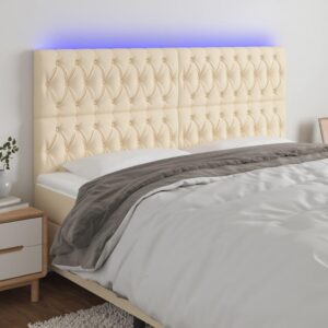Sengegavl med LED-lys 180x7x118/128 cm stof cremefarvet